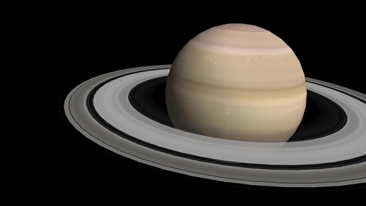CGI composite: planet Saturn with rings rotating, center-wide shot
