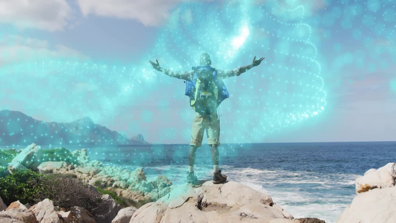 Hiker climbing rocky coast initiating glowing turquoise swirl wrapping torso powering adventure
