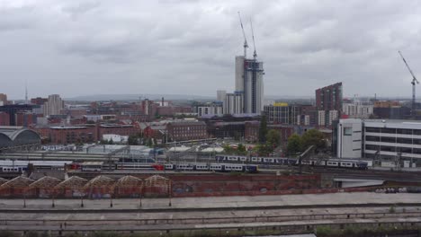 drone shot tracking train near manchester piccadilly station 05