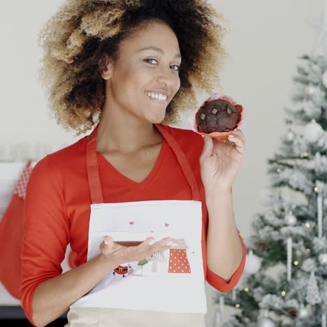 Pretty-young-woman-with-a-Christmas-cake