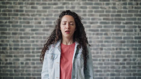 woman hiding face in distress