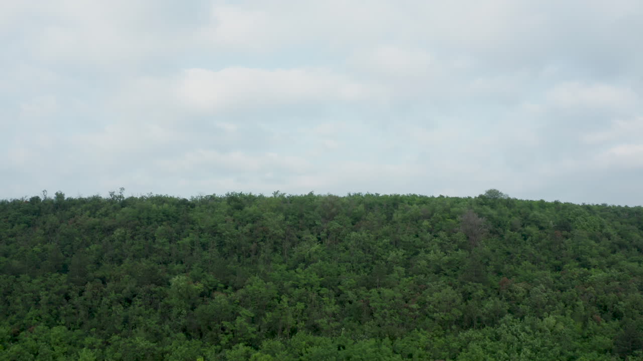 Green Hill with Overcast Sky