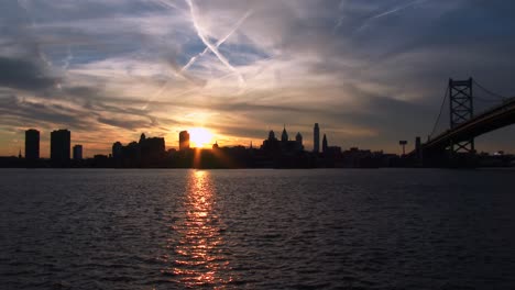 sunset behind the city of philadelphia pennsylvania