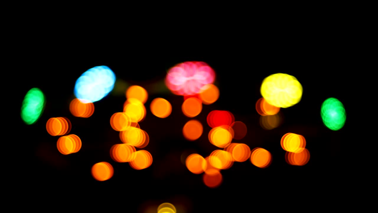 parque de atracciones bokeh por la noche