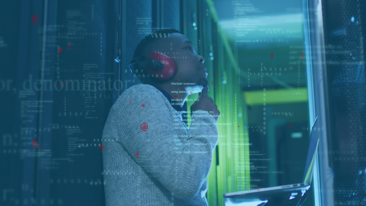 Animation of computer language, african american male engineer checking server using laptop