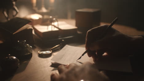 old passionate man writes a letter in his office at night