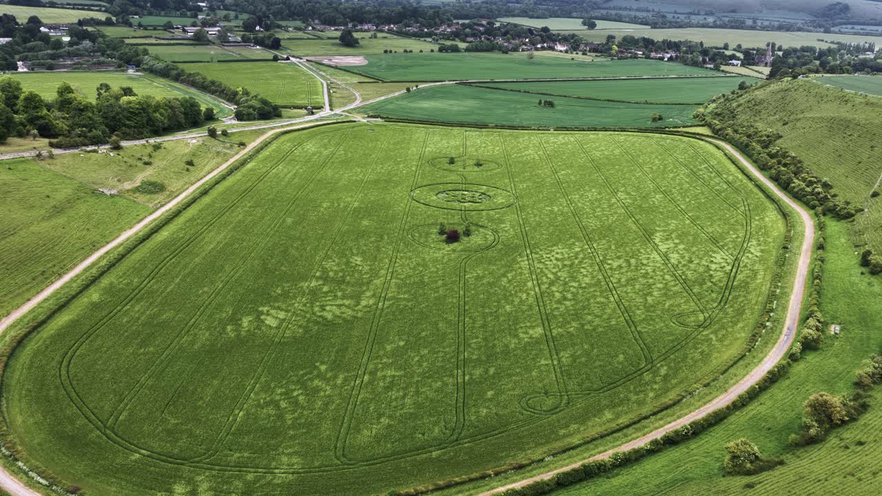 Wiltshire establishing barley field crop circle 2025 aerial view rolling the countryside horizon