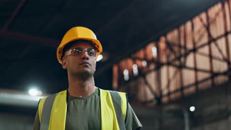 man wearing safety gear in warehouse