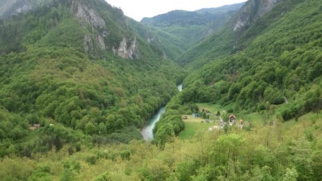 small village on the banks of tara river, in a gorge in northern montenegro, europe