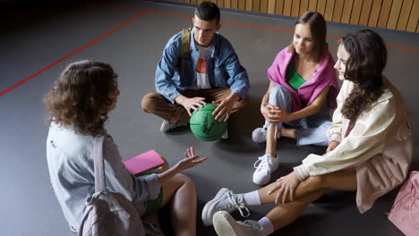 teenagers giving five to friend