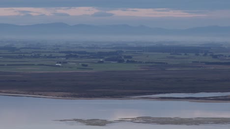 New-Zealand-plateau-with-ocean-and-sky-reflection-during-sunset