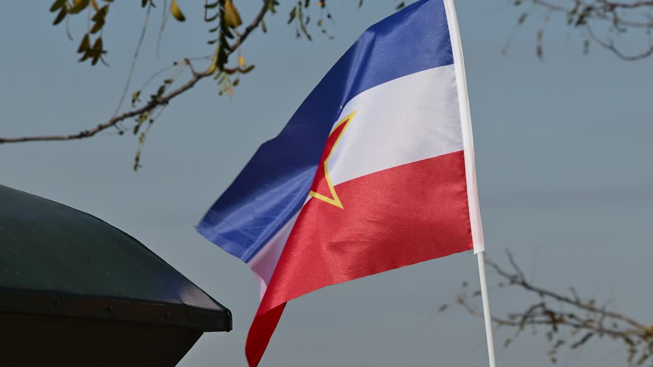 Flag of Yugoslavia flapping in wind