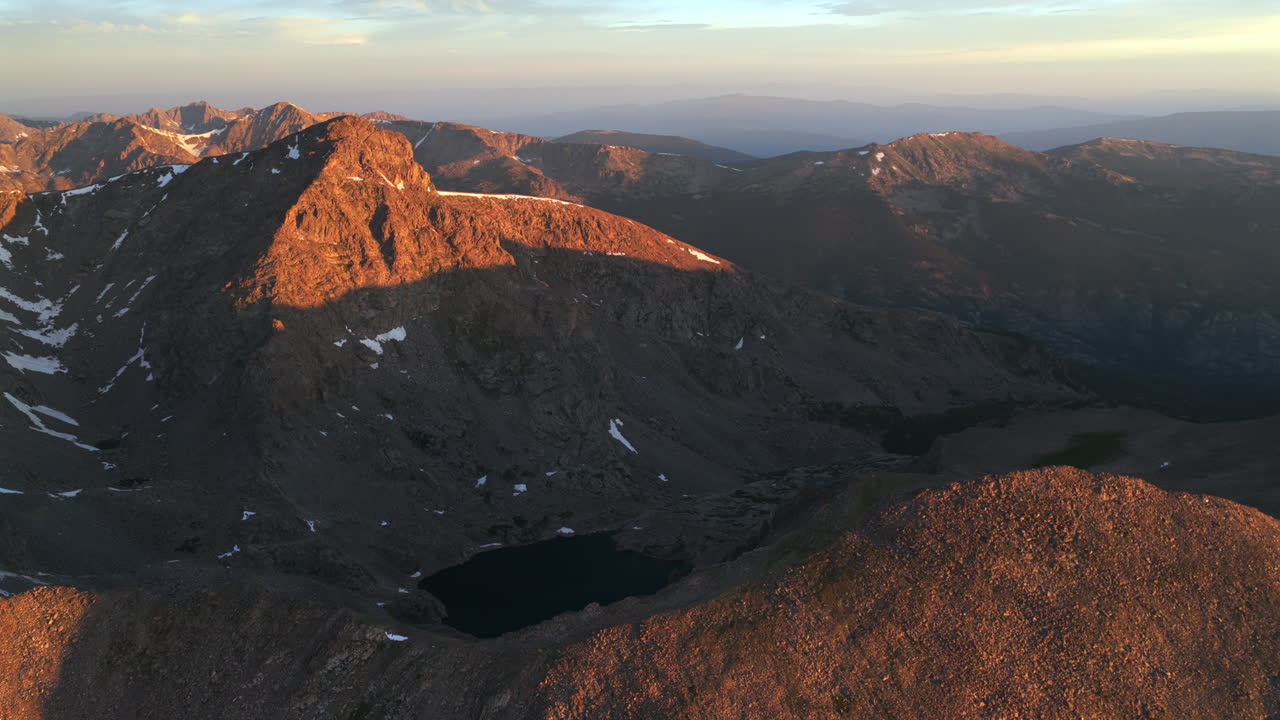 Notch Mountain Shelter sunset Halo Ridge Vail Minturn Redcliff aerial drone Colorado sunny blue sky summer Mount Holy Cross 14er peak Wilderness landscape Sawatch Range Rocky Mountains pan left