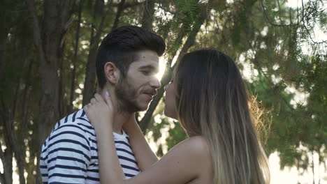 couple kissing in nature