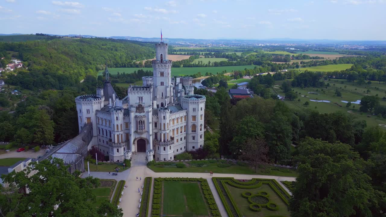 Marvelous aerial top view flight Hlubok&aacute; Nad Vltavou is a Fairy tale castle in Czech Republic Europe, summer day 2023