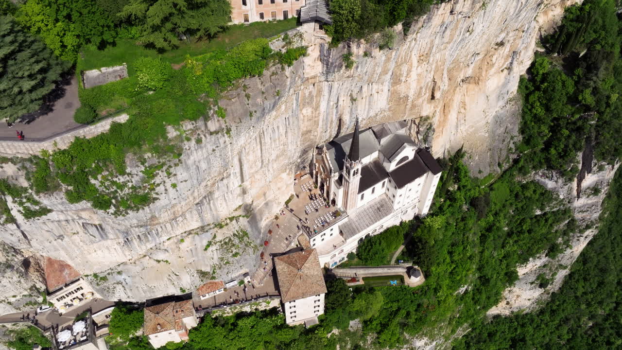 Sanctuary of the Madonna della Corona On The Steep Rock Mountainside In The Province of Verona, Italy. Aerial Drone Shot