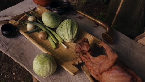 medieval feast with roasted pig and vegetables
