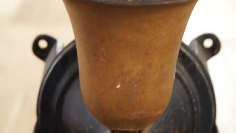 coffee grinder with coffee beans inside