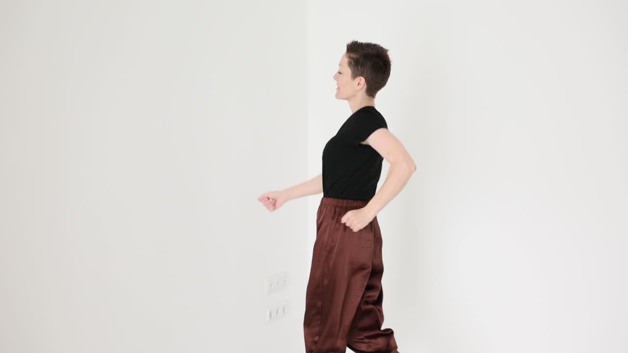 Woman Walking and Jogging in Studio