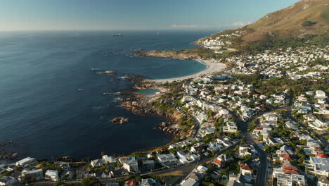 aerial view of bakoven rocky shore near camps bay beach in cape town, south africa