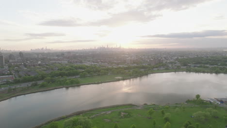 aerial view of queens, new york at dusk. shot in flushing meadows corona park.