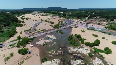 drone video of the popular swimming area called the slab in kingland texas