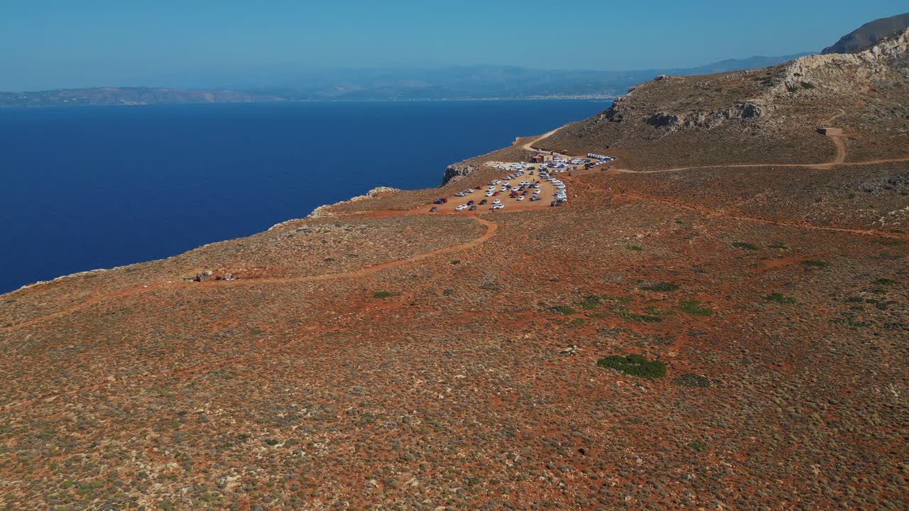 A Parking Lot In Isolated Landscape In Balos Beach Coast In Kissamos, Greece. Aerial Drone Shot
