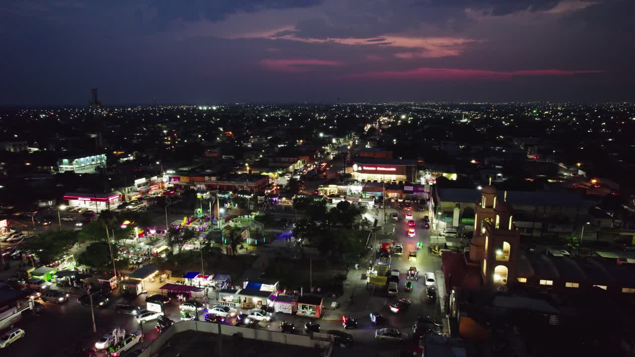 Vibrant Reynosa Night: Illuminated Streets and City Lights