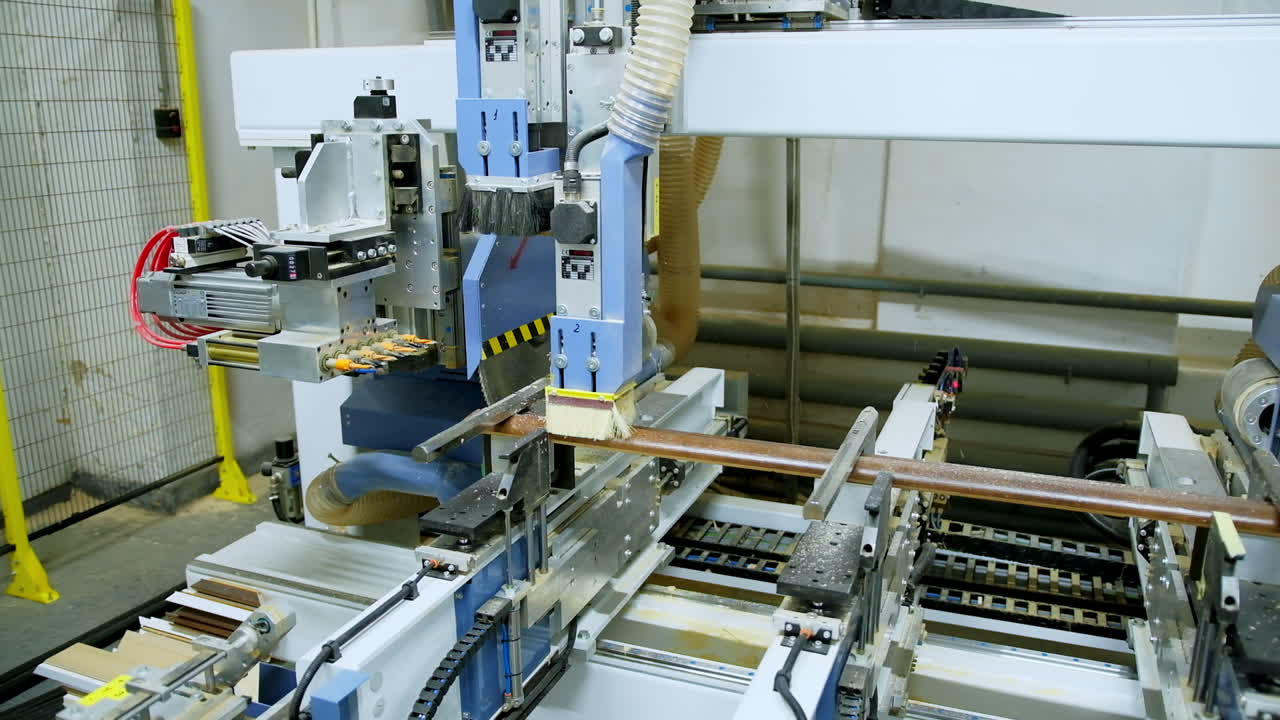 Industrial machine making wooden doors. Automated device for door production in the workshop. Modern industry.