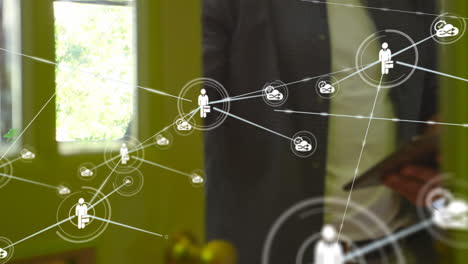 animation of network of connections over diverse businesspeople in office