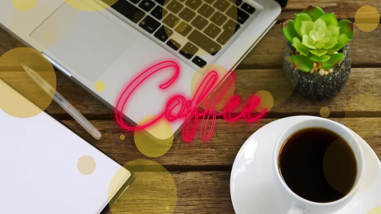 Animazione del testo 'coffee' su un ufficio e una tazza di caffè
