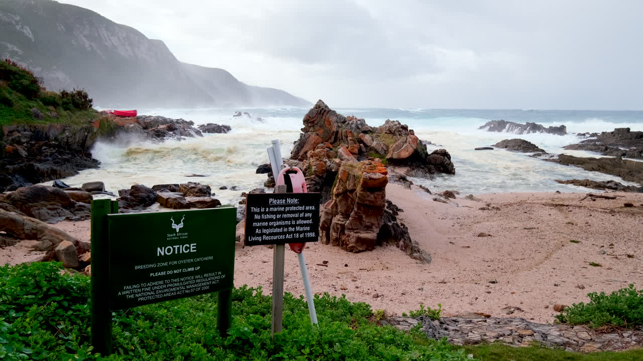 SANParks notice of oystercatchers breeding zone and marine protected area at small beach, Storms River Mouth, Tsitsikamma, Garden Route National Park