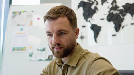 man working in a travel agency