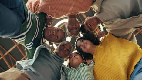 group of diverse kids in a huddle