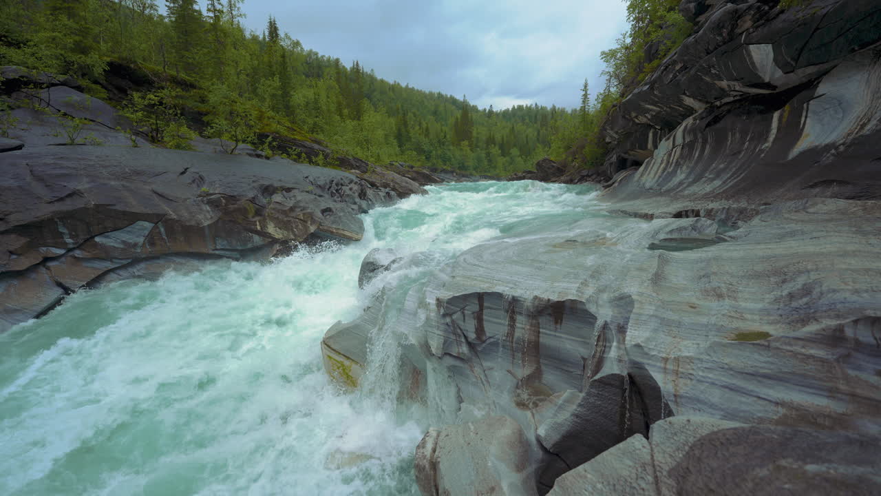 Marmorslottet Marmorfossen river. Nature Cinemagraph. Mo I Rana, Norway. Water carved Marble stone.