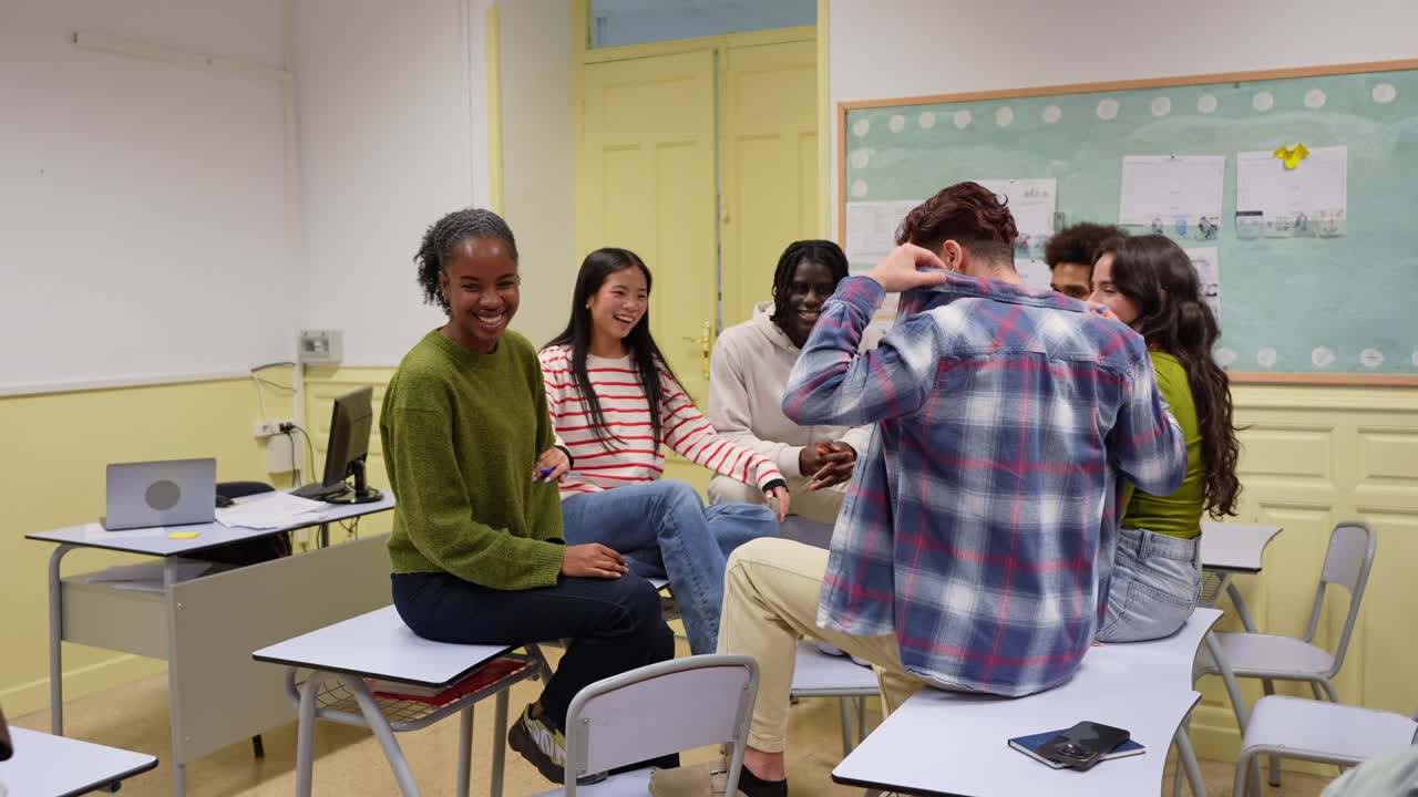 Diverse Group of Students Laughing and Talking in a Classroom