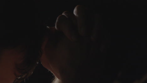 close up view of a man clasping his hands in prayer