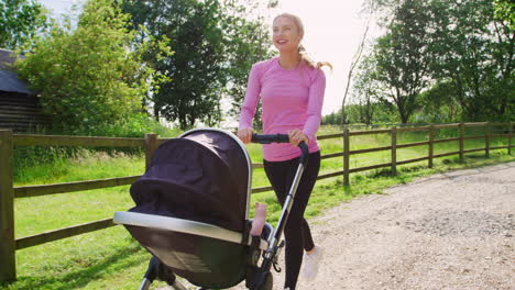 mother exercising by running whilst pushing baby buggy