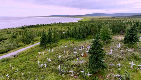 crosses-in-graveyard,-cemetary-in-koyuk-alaska-aerial-push-in