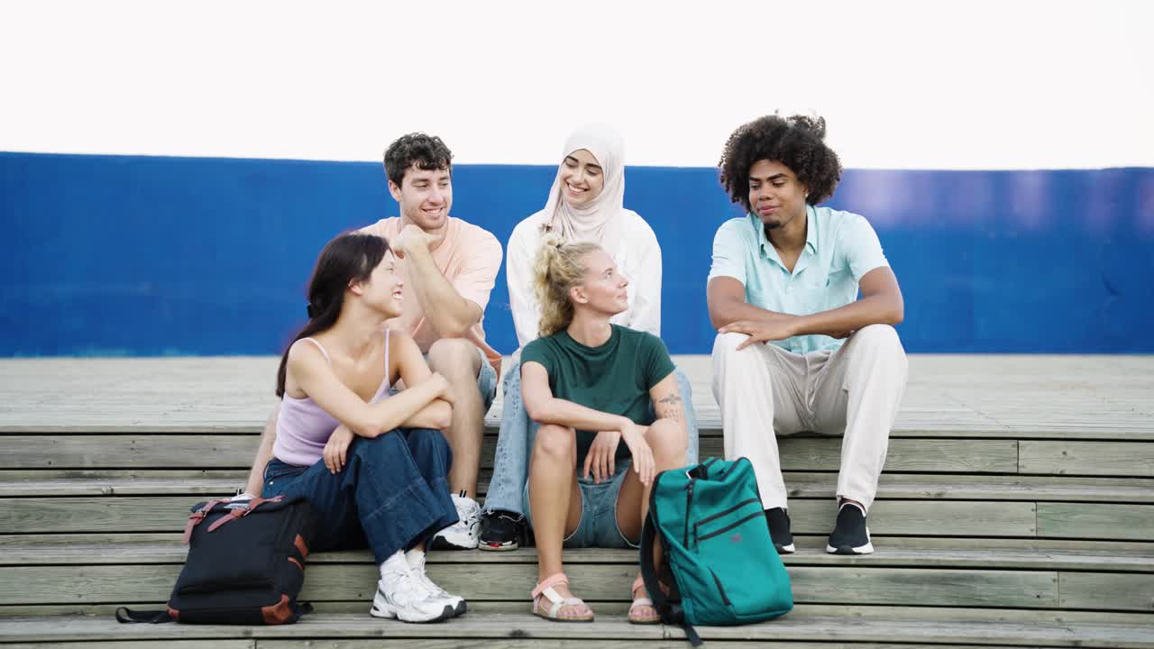 Group of Young Adults Sitting Together