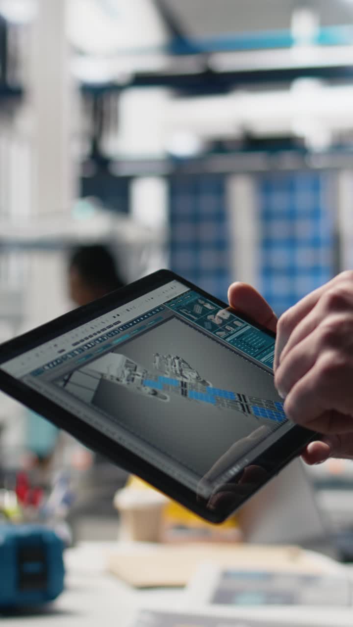 Vertical Video Quality control engineer in solar power factory evaluating industrial operations