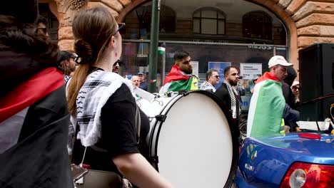 pro palestine protesters march against israel’s eurovision participation in malmö (sweden), calling for a ceasefire on the war in gaza, eurovision song contest 2024, medium handheld shot