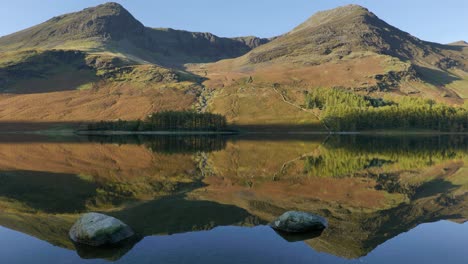 perfect autumnal scene at buttermere lake, cumbria, england