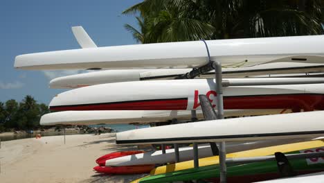 Green--surfboard-at-the-beach