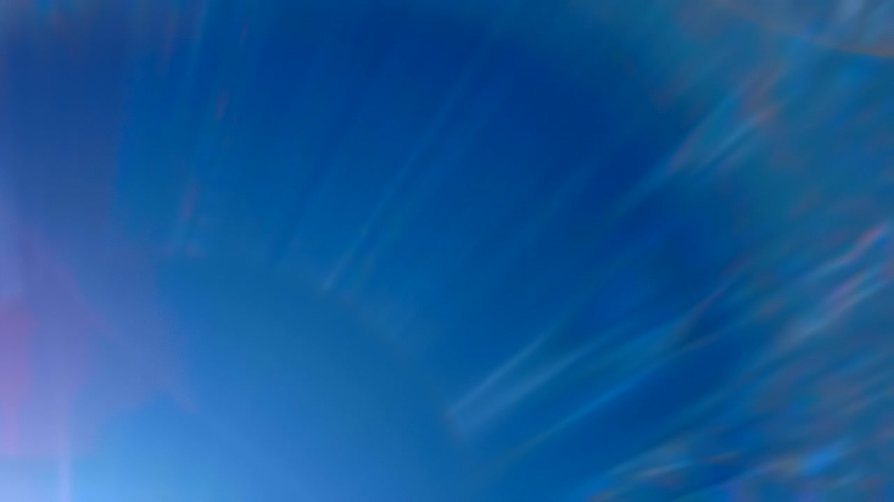 destellos coloridos en la lente de una fuente de luz brillante sobre un fondo negro