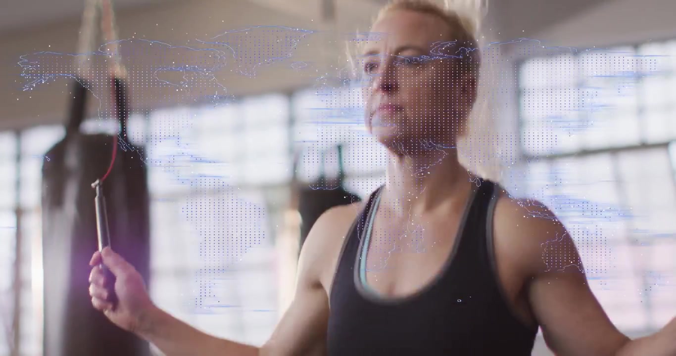 Camera rising, woman in sportswear skipping rope for fitness at studio, purple world-map overlay