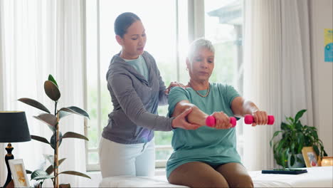 women, physiotherapist and patient with dumbbell