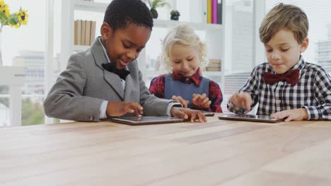kids as business executives using digital tablet 4k