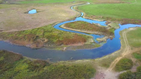 beautiful aerial view of the big canal in the lake cerknica, river rak