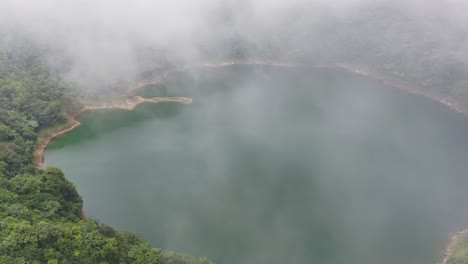 White-Clouds-Above-Peaceful-Lake-Danao-In-Islands-Of-Leyte-Near-Ormoc-City,-Philippines